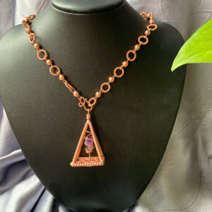 Nuban Pyramid Pendant: Harmony and Healing
